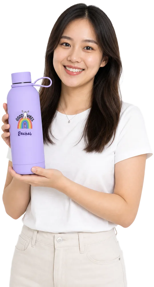 Woman holding a Lilac Purple Mizu tumbler printed with the Good Vibes Only rainbow graphic and the name Rachel